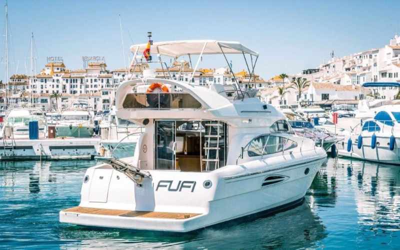 2 (2) Feel the allure of the open sea aboard our majestic Princess 70 yacht, a haven of luxury and elegance amidst the breathtaking backdrop of Marbella's azure waters